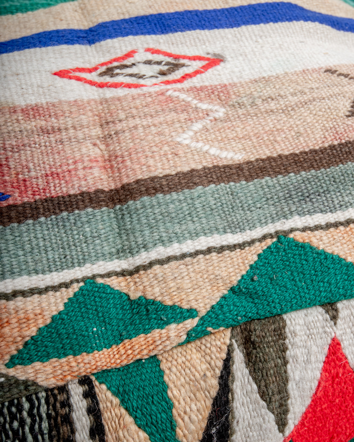 Vintage, handcrafted Berber floor cushion from Morocco. Kelim pouf with beautiful designs and robust flat weave. 100% wool.